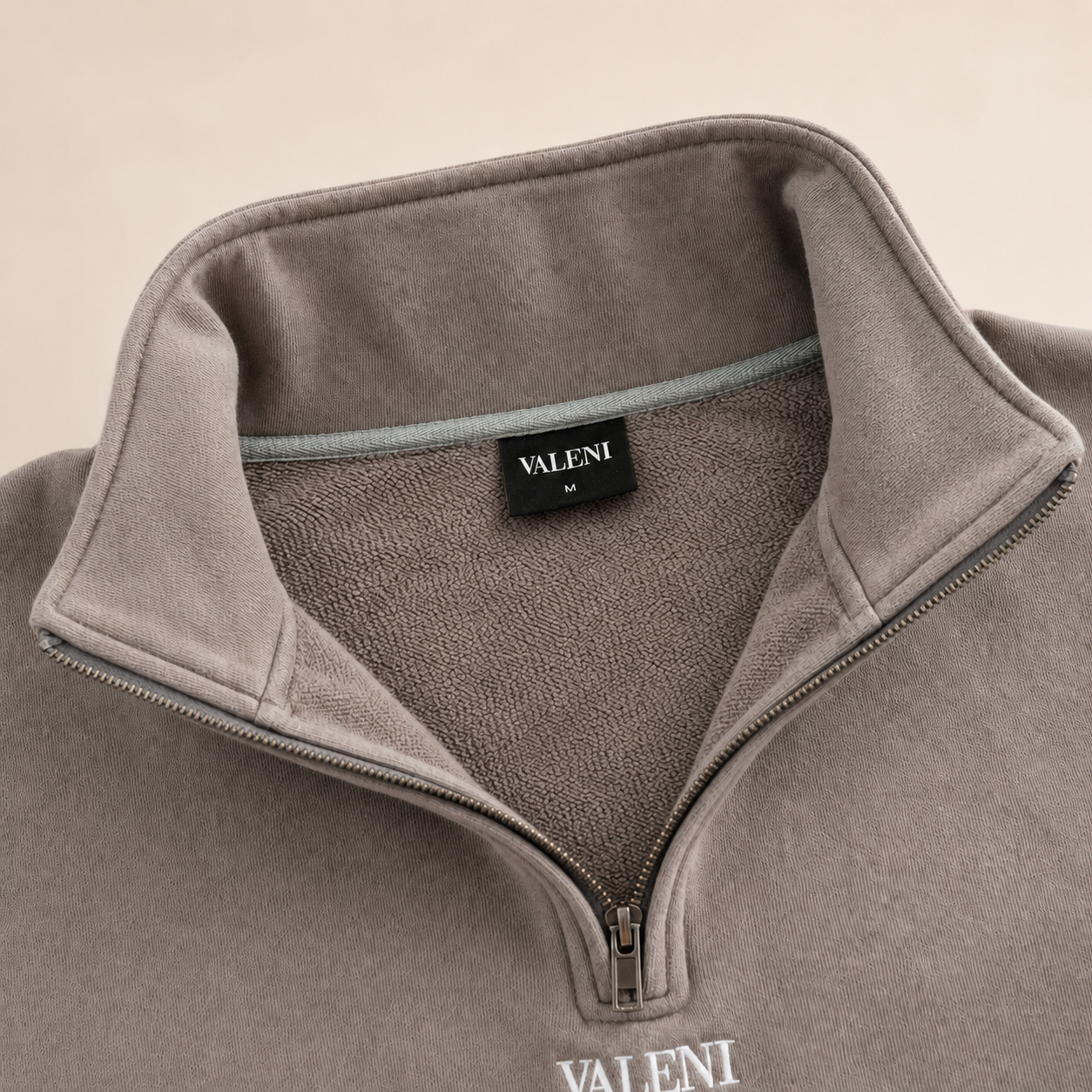 THE HALF ZIP