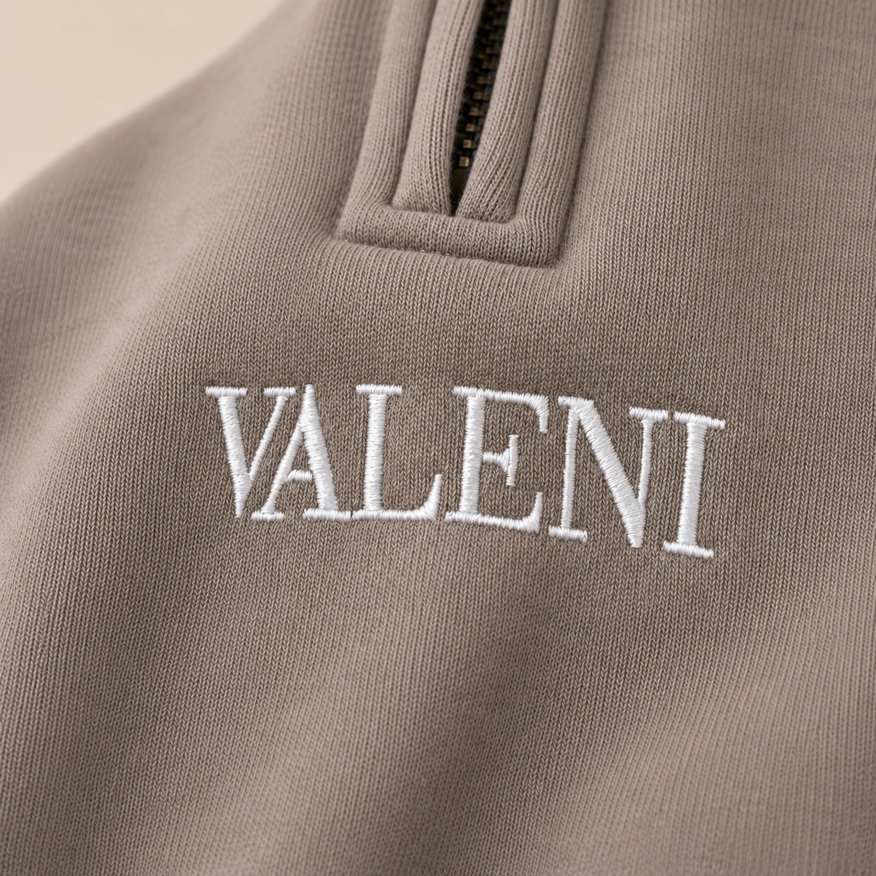 THE HALF ZIP